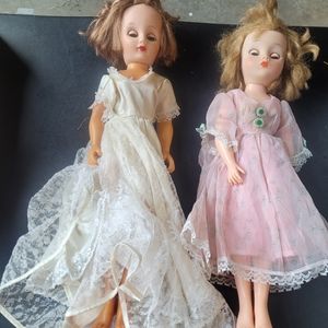 2 preowned vintage 1940s-1950s dolls with clothes